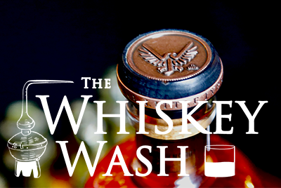 The Whiskey Wash logo with bottle top from Whiskey Jypsi bourbon bottle